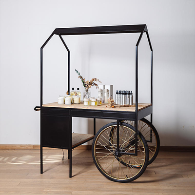 Mode d'opération à poussée manuelle L'art de concevoir un chariot alimentaire mobile à trois roues motrices